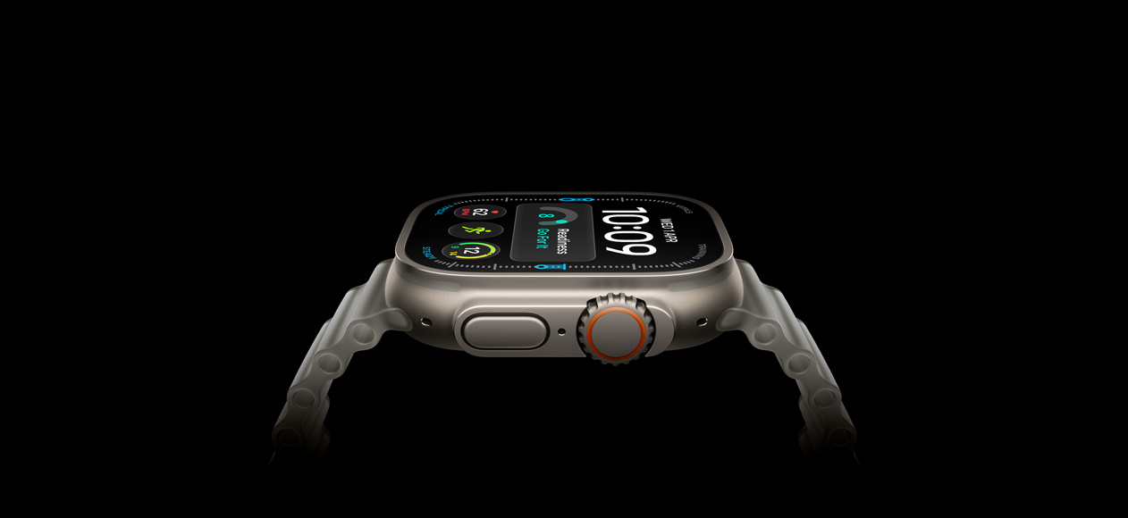 Apple Watch Ultra 4, titanium case, natural color, right exterior, Digital Crown, raised side button, digital watch face, translucent gray Ocean Band