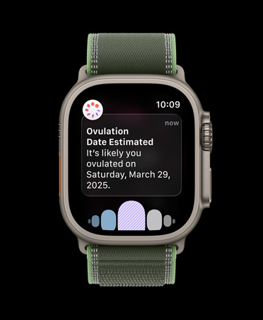 Apple Watch Ultra 3, титановий корпус натурального кольору, сповіщення про ймовірну дату овуляції від функції «Відстеження циклу» в додатку «Здоров’я», браслет Trail кольору «зелений/неон»