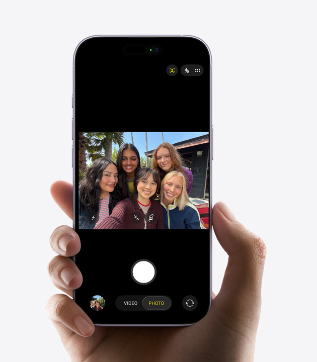 iPhone 17, front exterior, Centre Stage for photos feature in use, group of people taking a selfie