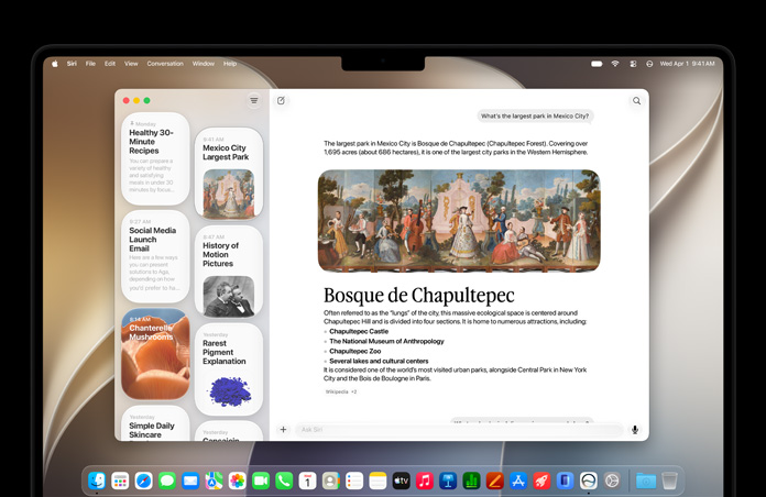 MacBook Pro 14 inci berwarna Hitam Angkasa, layar menampilkan aplikasi Siri dengan percakapan Siri AI aktif dan percakapan sebelumnya di bar samping.